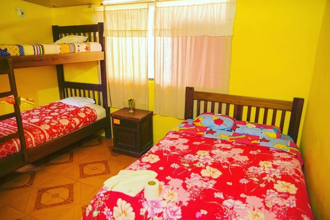 Hostal Henrry'S Hotel Миндо Екстериор снимка